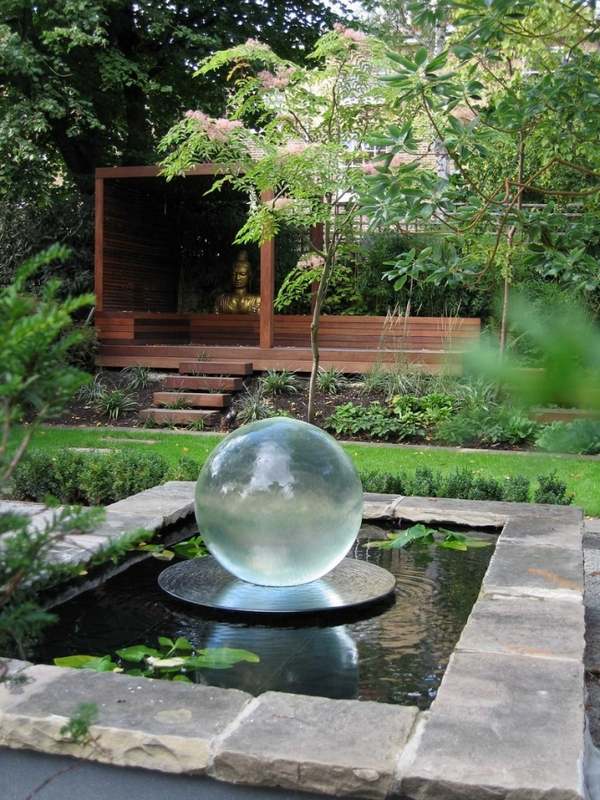 landscaping ideas small glass ball fountain wooden pergola