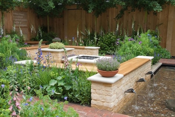landscaping ideas wooden benches water feature gravel 