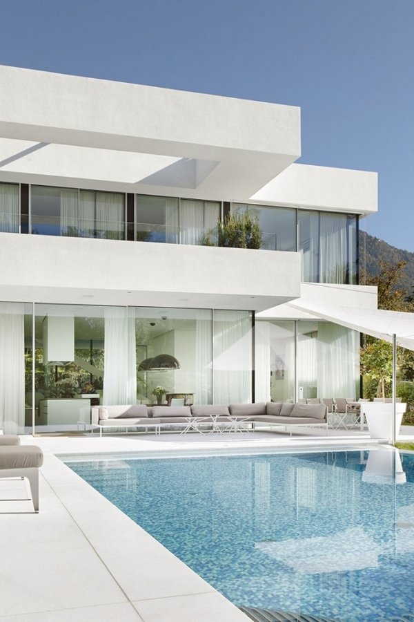 modern house white facade pool terrace glass walls
