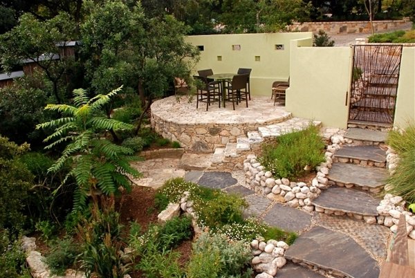 patio design ideas garden stone flooring sitting area