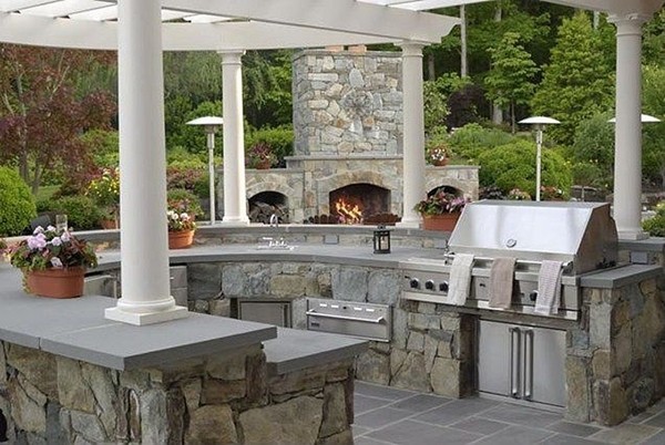 patio-design-ideas-outdoor-kitchen-stone-fireplace-oven-wooden-pergola