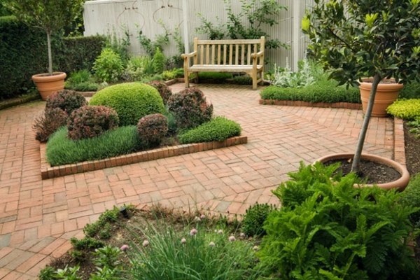 plant island red brick flooring pots