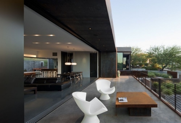 relaxing-balcony-design-interior-exterior-white-designer-chair-contrast