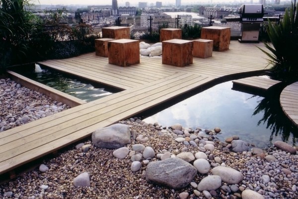 roof balcony design gravel stones wooden deck 