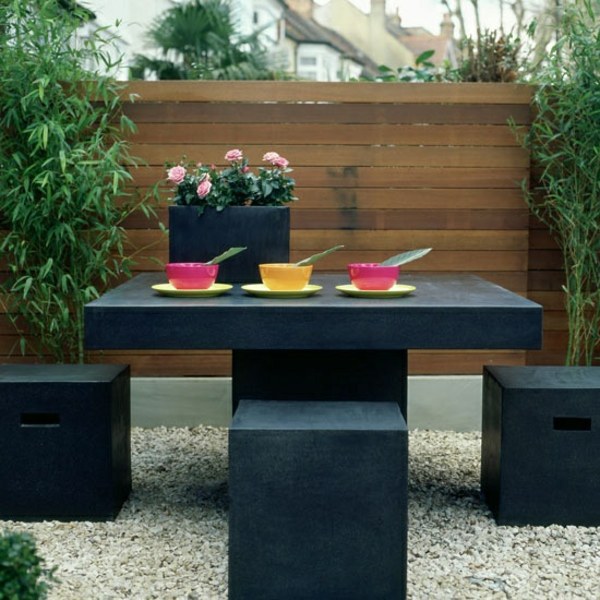 small garden design black furniture bamboo plants feng shui style
