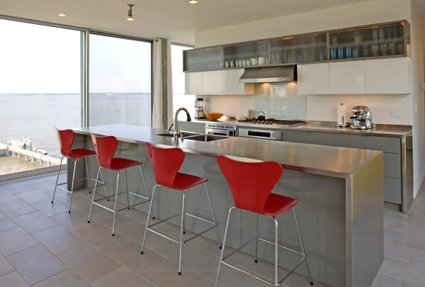 stainless counters modern design red chairs