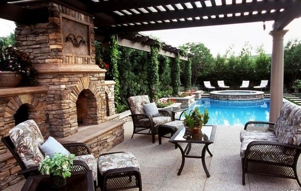 patio pool pergola outside fireplace and natural stone cladding