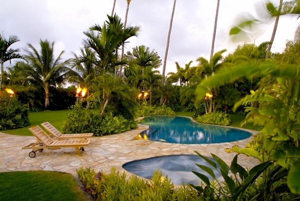 tropical pools palm torches stone walkway