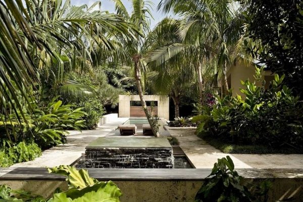 tropical water feature fountain stone concrete walkway