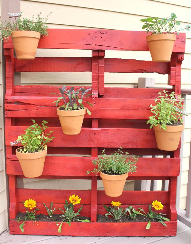 vertical garden red painted clay pots