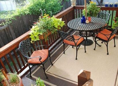 Balcony-wooden-railing-modern-metal-chairs