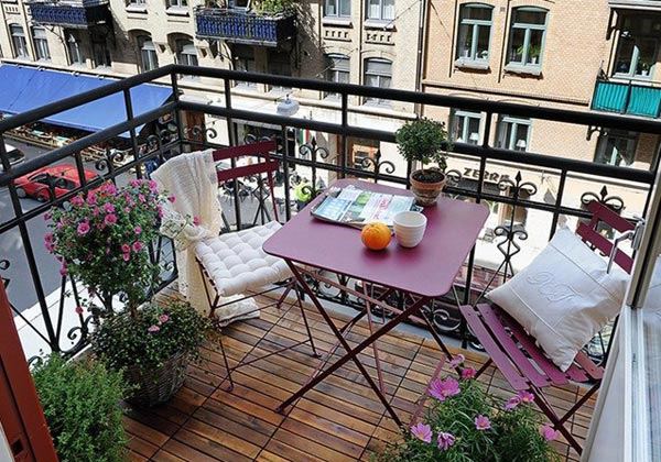 Comfortable design balcony sitting area metal table