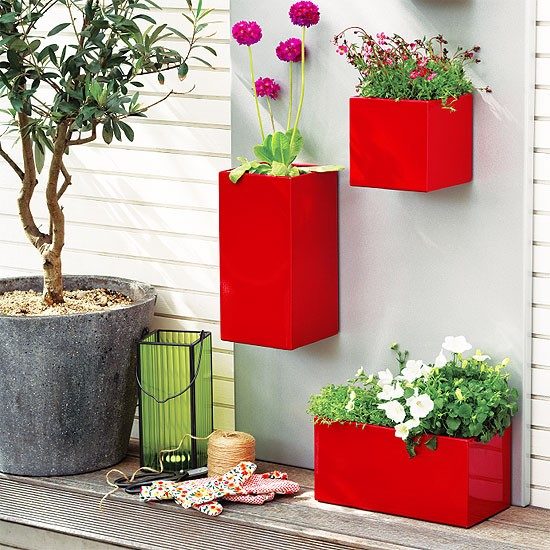 DIY decorating ideas red planters wall