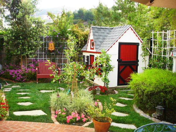 garden house stone slabs on lawn