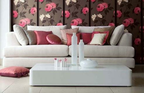 Floral pattern pink pillows white sofa and table