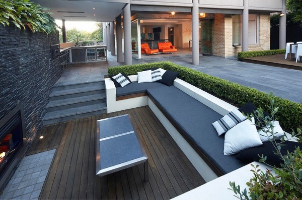 Garden design furniture pillows gray white black wooden deck