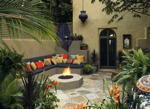 ethno ideas design patio fireplace concrete sofa