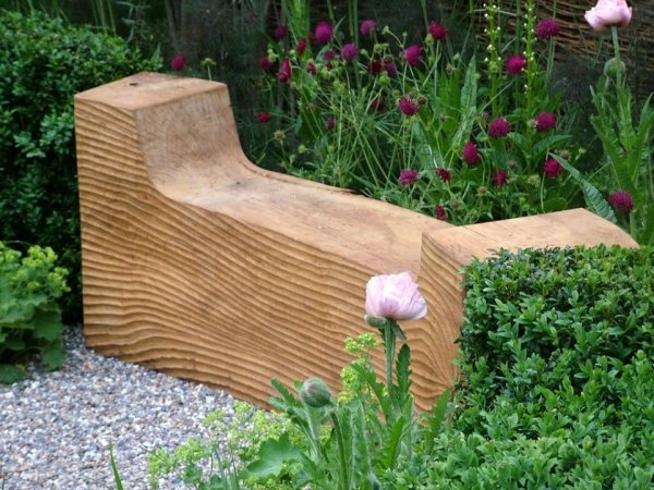 garden bench from wood tree trunk