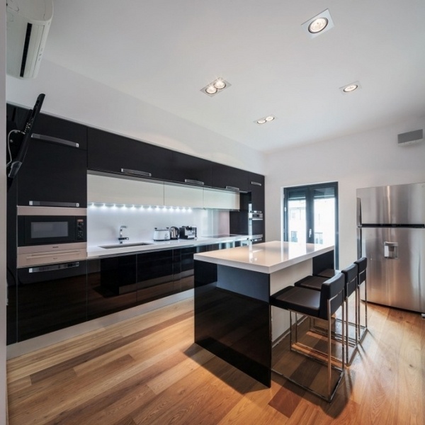 modern kitchen high gloss black cabinetry