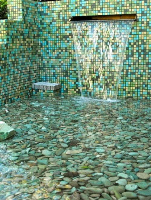 outdoor shower in the garden mosaic tiles green wall