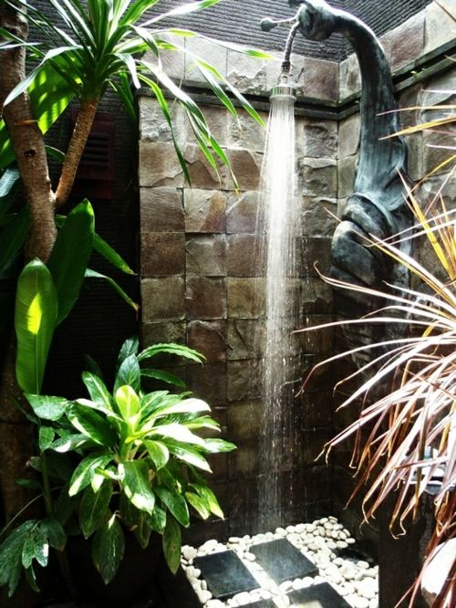 outdoor shower in the garden snail shape