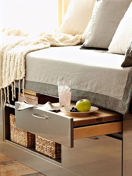 Bed with drawers and small table