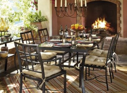 Garden-dining-furniture-metal-carpet-fireplace-candles-chandelier