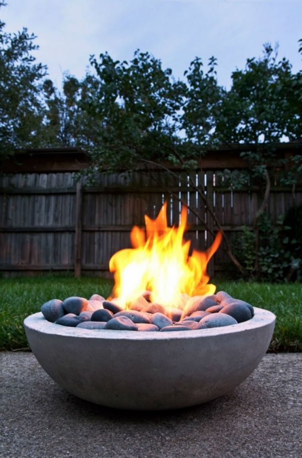 backyard fire pit ideas round shape stones 