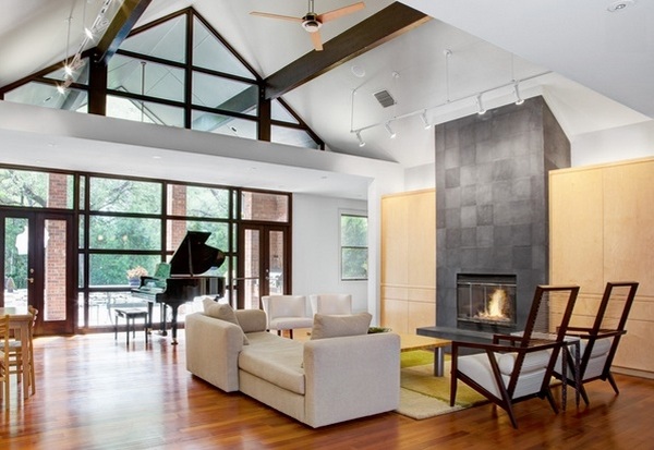 high ceiling exposed beams natural slate fireplace contemporary living room 