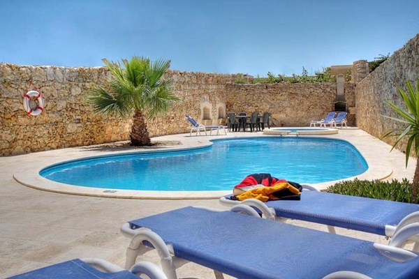 inground kidney shaped swimming pools design natural stone wall