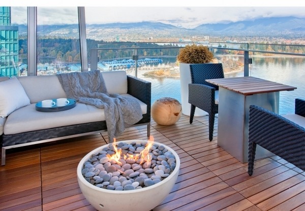modern-balcony-fire-pit-round-shape-wooden-flooring 