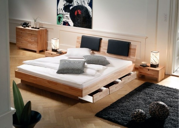 modern bed with wooden storage drawers
