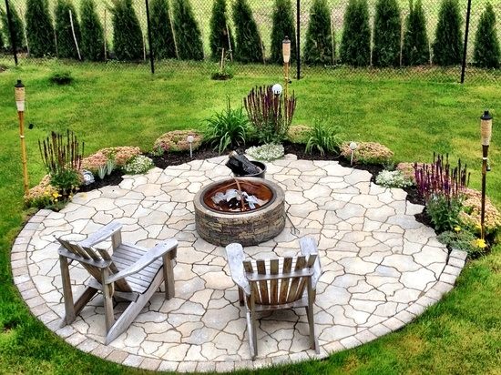 natural-stone-round-fire-pit-design-in-garden