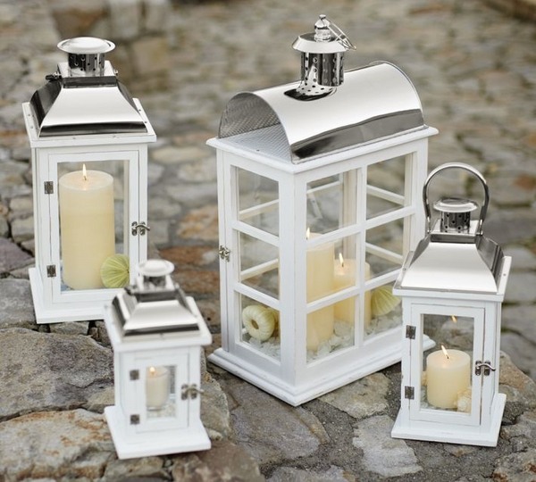 outdoor lighting ideas candles lanterns white wood 