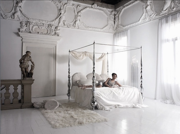 romantic bedroom with poster bed silver