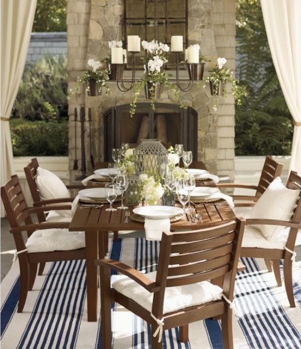 wooden outdoor dining furniture set white padding stone fireplace
