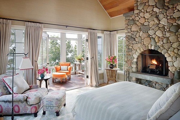 Bedroom with comfortable armchair table