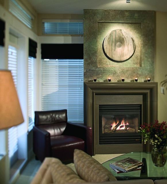 Contemporary-fireplace-surround-ideas earthy colors metal decoration