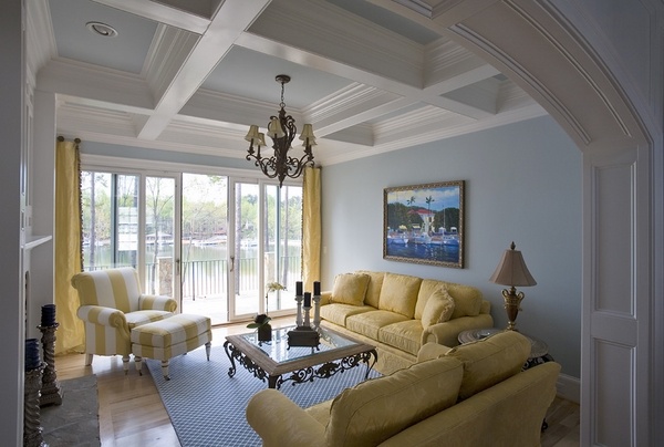 Family room with coffered ceiling suspended lighting chandelier