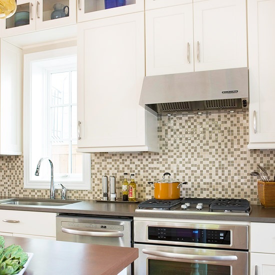 mosaic tiles backsplash white cabinets
