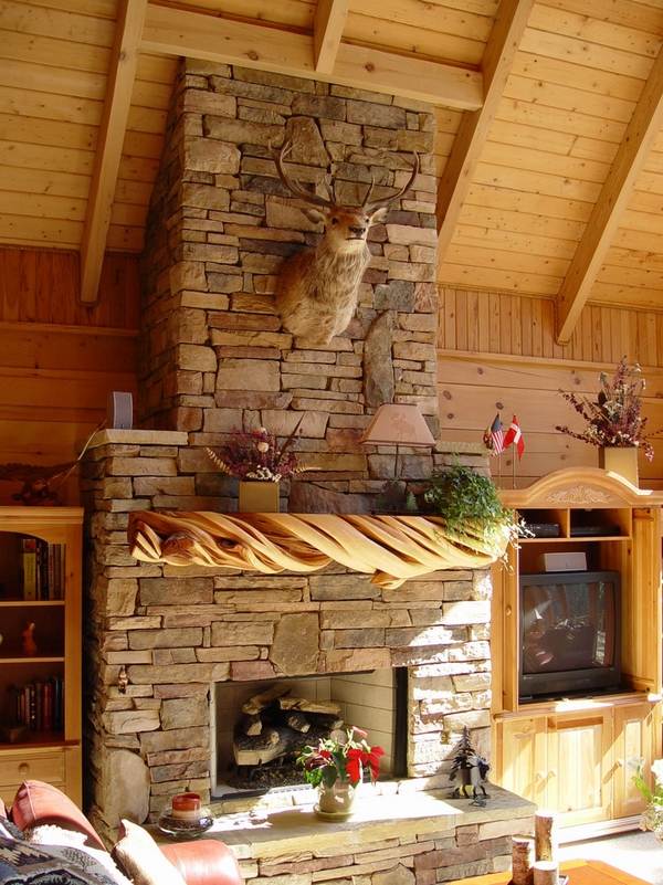 Rustic-fireplace-mantels-driftwood-mantel-natural-stone-surround