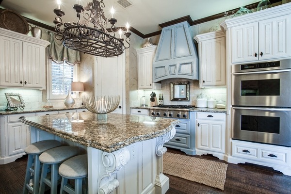 Santa-Cecilia-granite-countertops-kitchen ideas white cabinets blue accents