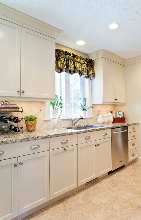 Santa-Cecilia-granite-countertops-white kitchen cabinets