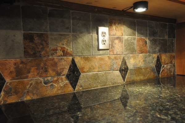 Uba Tuba granite countertop tile backsplash lighting