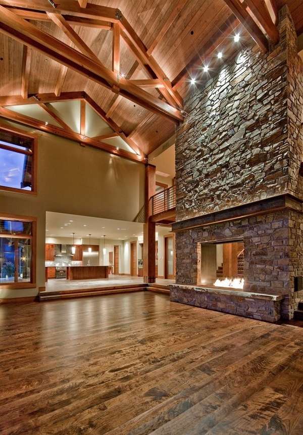 stone accent lighting cathedral ceiling wood flooring