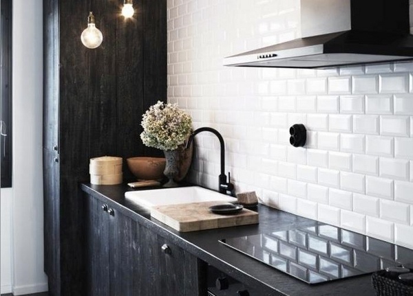classic-white-tile-backsplash-black kitchen cabinets