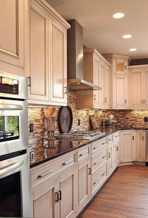 contemporary kitchen neutral colors stone tile backsplash light cabinets
