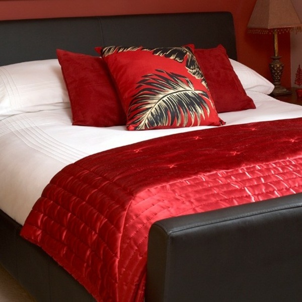 how to decorate a small bedroom red decorative pillows