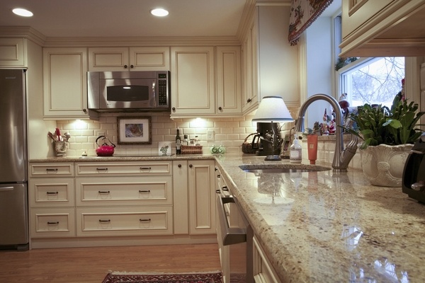 santa cecilia light granite countertops white cabinets stainless steel appliances