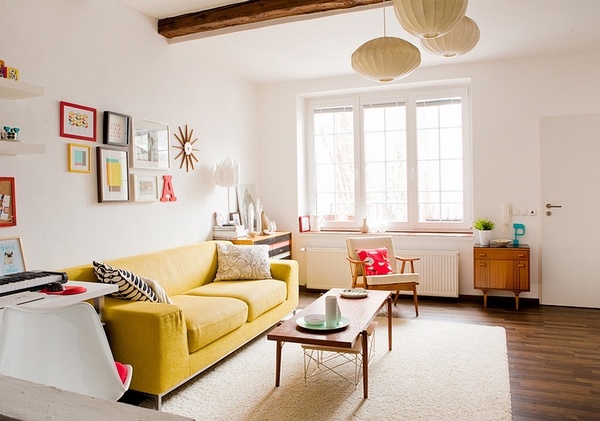 small living room decorating ideas yellow sofa exposed ceiling beams modern pendant lighting fixtures